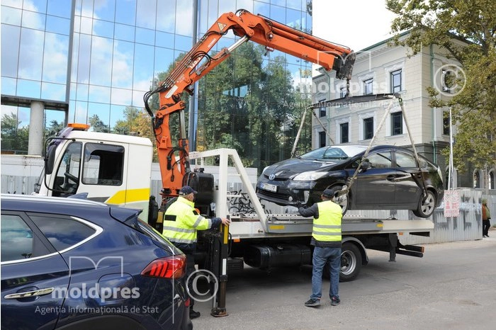 Votat: Ridicarea vehiculelor va fi permisă doar în anumite condiții